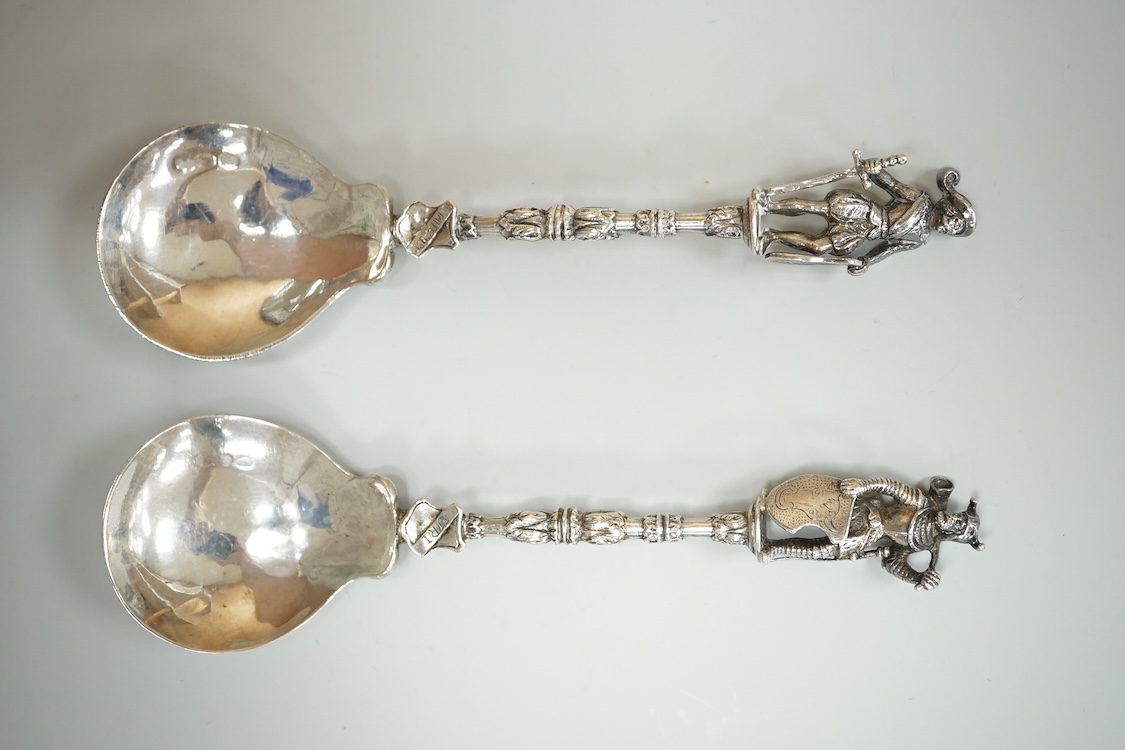 A pair of late 19th century Hanau silver spoons, with warrior finials, import marks for John George Smith, London, 1898, 18.6cm, 5oz.